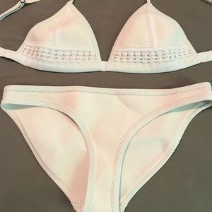 Triangl white swimsuit with crochet detail